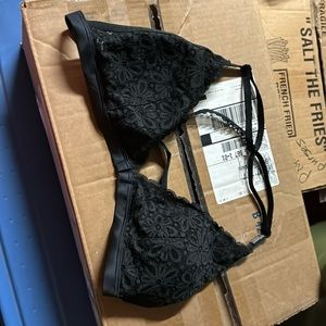 Victoria’s Secret black bra size extra large.